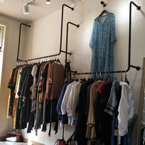 Clothing store on the wall hanging clothes rack Womens store shelf hanger side hanging display simple hanger