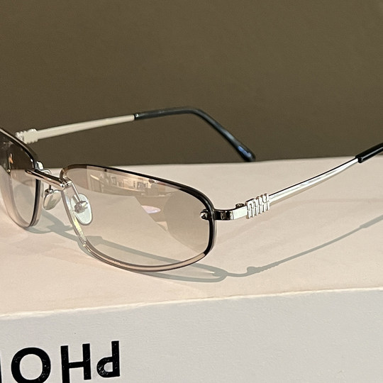 European and American frameless mercury y2k oval sunglasses 2025 new style versatile high-end photo concave shape sunglasses