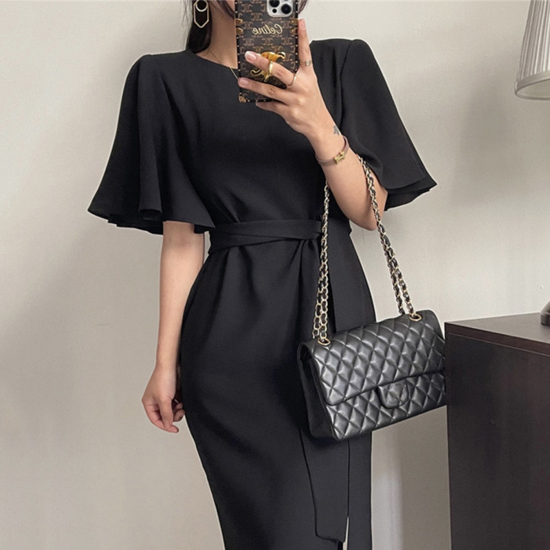 Blackthe republic of korea chic French grace Crew neck Frenulum Close your waist Self cultivation Show thin Buttocks Over the knee have more cash than can be accounted for Lotus leaf sleeve Dress