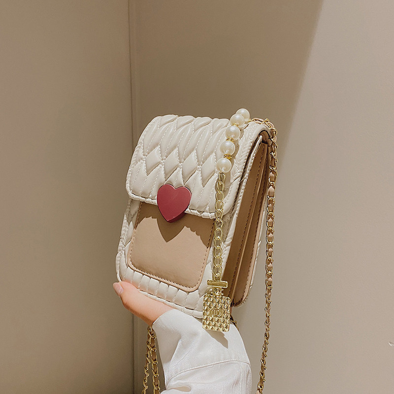 French niche put up mini bag girl 2022 new blast leather fold single shoulder strand strand bag