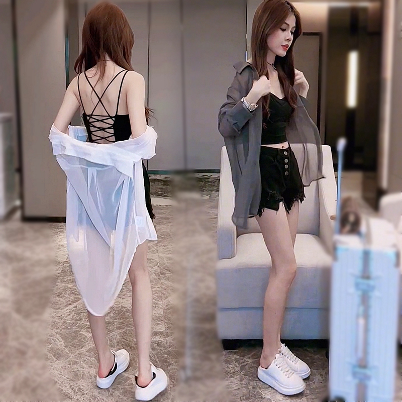 Fashionable and Youthful Casual V-Neck Sexy Backless Camisole + High-Waisted Frayed Denim Shorts + Sheer Long-Sleeved Sun Protection Shirt