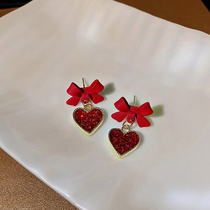Xiangfeng red bow peach heart earrings female Korean 925 silver pin niche design sense bride stud earrings