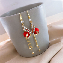 2022 New red pearl peacock fluttering suearrings high-grade sensual net red long earrings with earnestle ears decorated with female tide