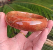 Ningqiang coral jade fossil red yellow and white scroll pattern water wave snow pattern royal concubine bracelet ring 6062 has crack processing