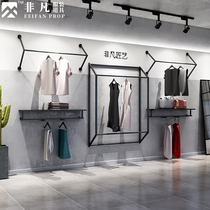 Extraordinary clothing store display shelves on the front side of the wall hanging creative combination men's and women's clothing shelves wrought iron display shelves