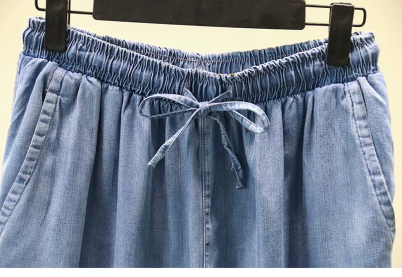 Mùa hè mới bảy điểm quần jeans tencel trung niên và cao tuổi eo cao có dây thun co giãn eo quần rộng mẹ mặc quần nữ - Quần jean