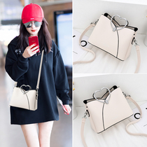 Hong Kong boomer 2022 new net red genuine leather single shoulder bag female brief Pop Sloping Satchel Handbag with Pet Bucket Bag