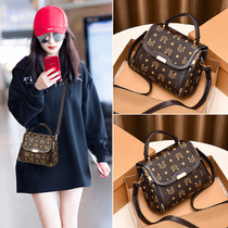 Hong Kong 2021 new internet red 100 hitch fashion ins slanted satchel leather small bag hand single shoulder bag female pet tide