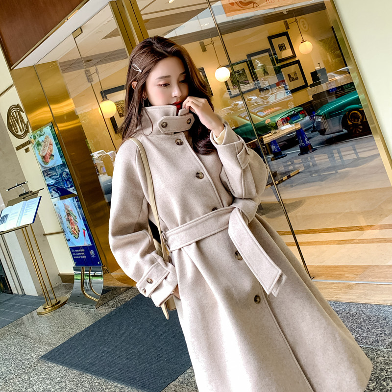 The pure color high - collar windshirt woman 2021 autumn and winter new small man wears a hair - clothes coat in the middle and long edition of a thin coat