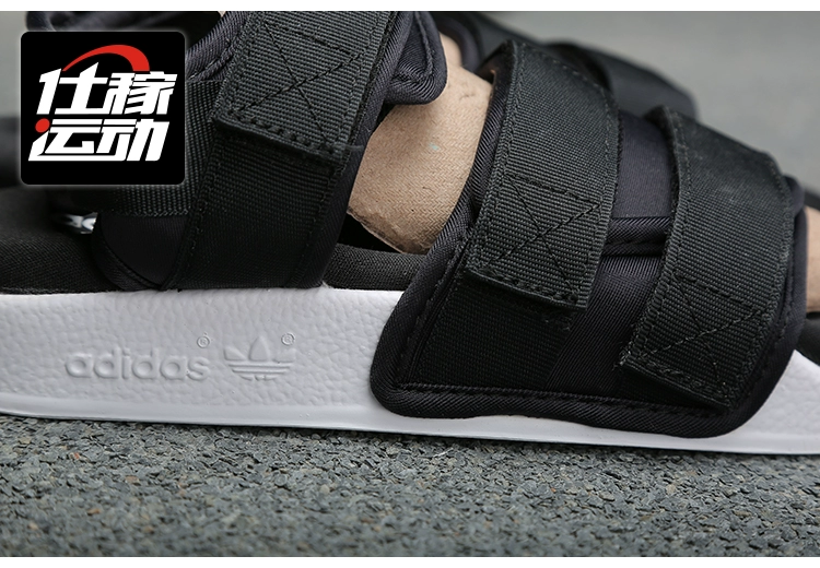 Adidas Adidas cỏ ba lá thể thao bãi biển giày dép ADILETTE Velcro giày của phụ nữ S75382