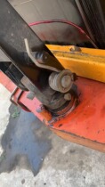 Semi-electric forklift wheel spring handle back spring