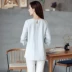 Wenyi Quạt lỏng loa nhỏ bảy điểm tay áo sơ mi nữ 2018 xuân mới cổ tròn tay áo cánh sen thêu áo thủy triều áo sơ mi nữ trắng Mùa xuân