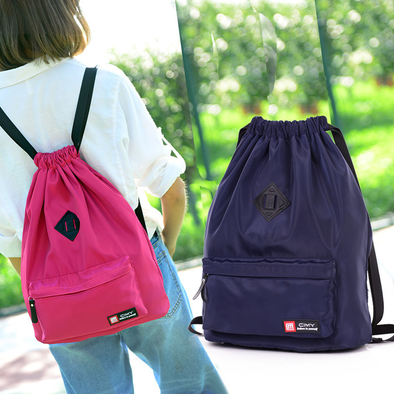 Drawstring backpack waterproof travel bag for men and women lightweight fitness corset pocket simple folding storage bag Sports Backpack