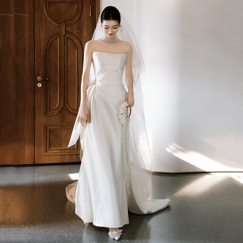French-Style Strapless Light Wedding Dress 2026 New Model for Brides, Simple Satin Gown with a Trailing Train, Elegant White Engagement Dress French-Style Strapless Light Wedding Dress 2026 New Model for Brides, Simple Satin Gown with a Trailing Train, Elegant White Engagement Dress