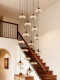 Staircase Chandelier 2026 New Model, Mid-Century Style, Elegant and High-End, Cream Style Water Drop Loft Duplex Open Space Long Chandelier