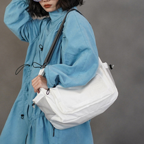 Original small crowdsourced Japan-South Korean slanted satchel pure color waterproof single shoulder bag 2022 new dumplings Casual Fashion Bag woman