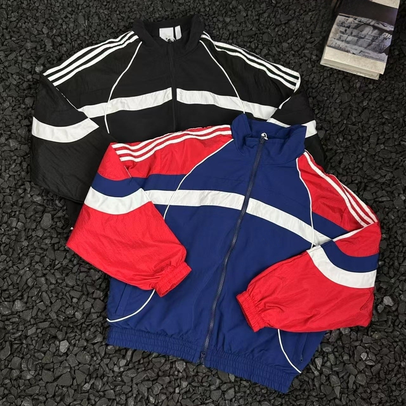 2026 New Spring and Autumn American Retro Sports Stand-Up Collar Color-Block Three-Stripe Jacket Unisex Loose Windbreaker Coat 2026 New Spring and Autumn American Retro Sports Stand-Up Collar Color-Block Three-Stripe Jacket Unisex Loose Windbreaker Coat