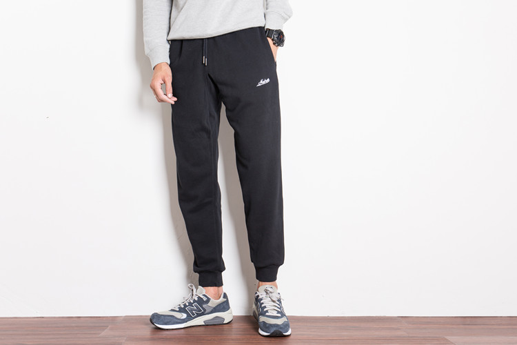 Mùa đông và mùa đông quần thể thao quần nam rạng rỡ cotton giản dị cộng với quần nhung lỏng chân đóng quần Harlan Wei thủy triều quần bò nam