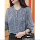 ເສື້ອພິມ polka dot ທີ່ມີສະໄຕຂອງແມ່ຍິງ