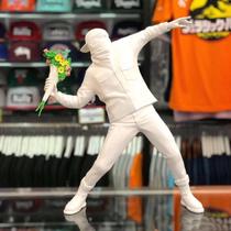 Banksy Banksy threw flowers boy throwing flowers at BANKSY throwing flowers boy Pauli Stone Crafts