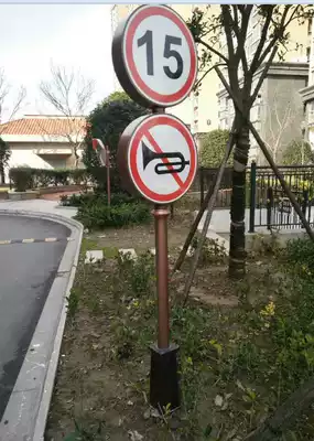 Community speed limit sign pointing to signs, street signs, billboards, multiple guide signs, direction, underground garage