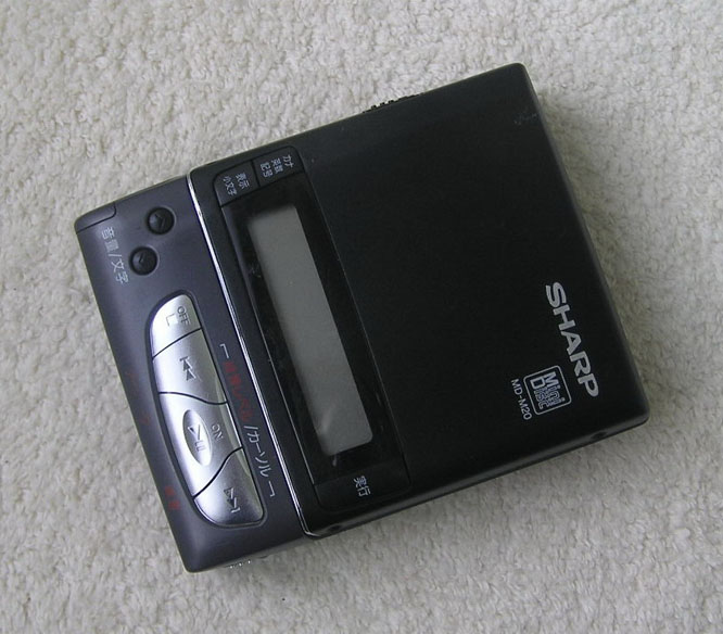 Кассетный плеер sharp jc-118. Плеер sharp кассетный jc. Проектор со встроенным blu-ray disc плеером. Кенгуру шарп плеер. Minidisc-плееры.