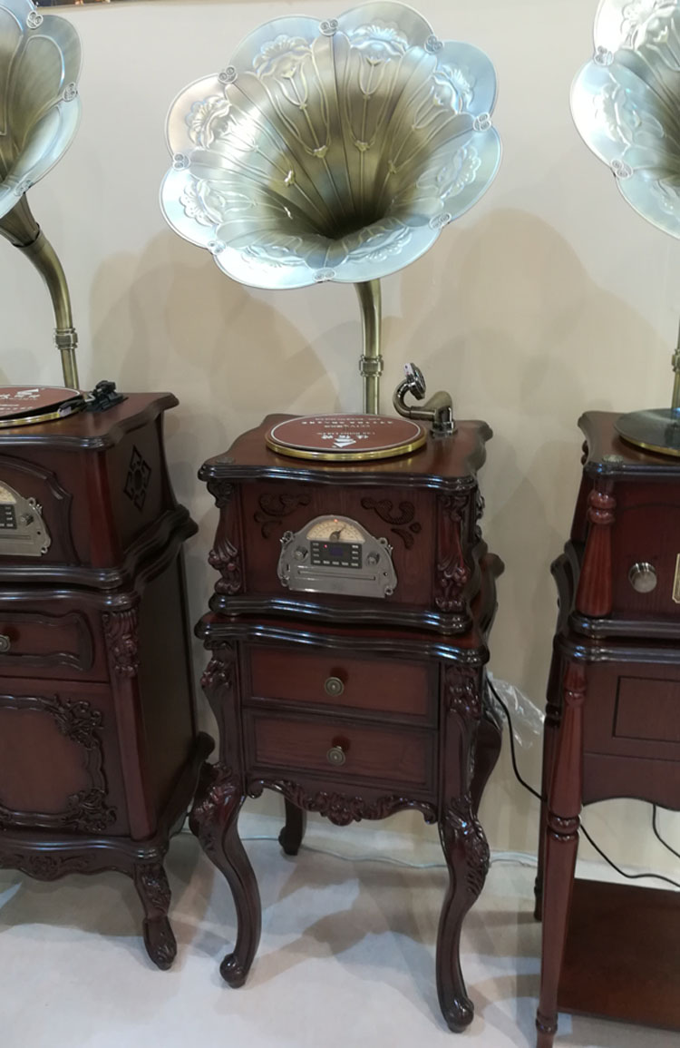 máy nghe nhạc đĩa than tiếng anh	 Gỗ cao cấp phiên bản Bluetooth loa siêu trầm retro lớn sừng máy ghi âm vinyl ghi âm máy nghe nhạc DVD - Máy hát 	đầu đĩa than liền amply