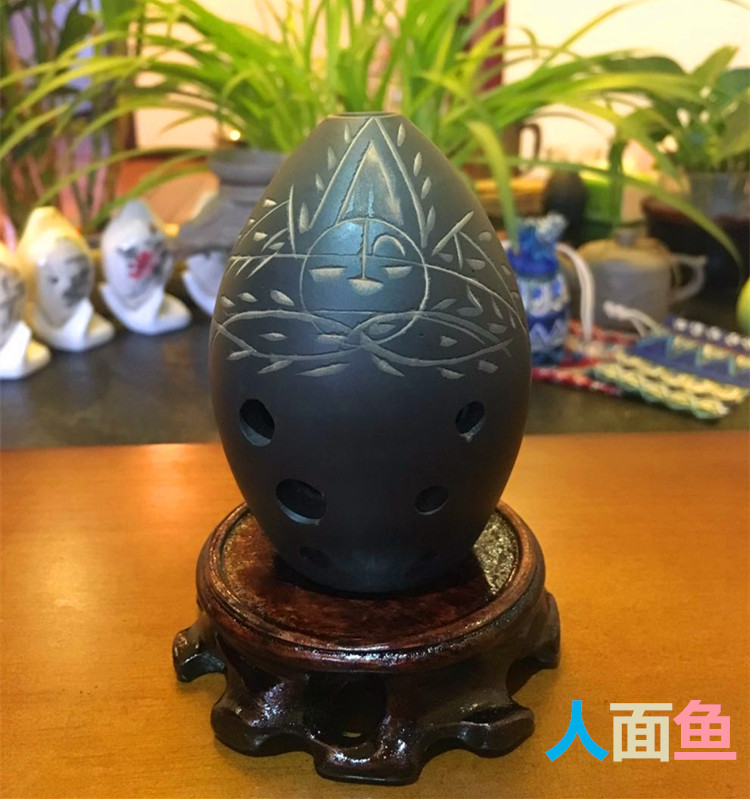 Cổ đại instrument nhạc cụ dân tộc Tao Taoxun đen tám lỗ shape hình quả lê mới bắt đầu chơi nhạc cụ 埙 mua đàn cổ cầm