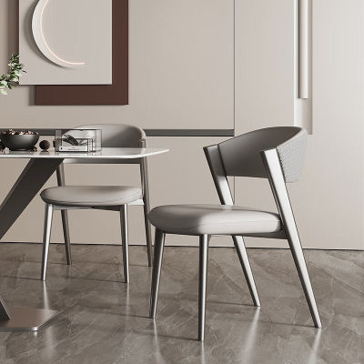The 2025 new high-end dining table and chair, with a backrest for dining, is a Nordic Italian designer dining chair for home use