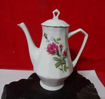 Old teapot tea tool in the 70s white porcelain floral decoration floral to the folk - custom home movie props physical photo