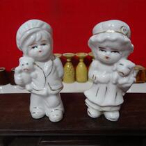 Ceramic girls put a pair of old ceramic plastic playing 90s gold hand painting nostalgia collection of all the objects to take photos