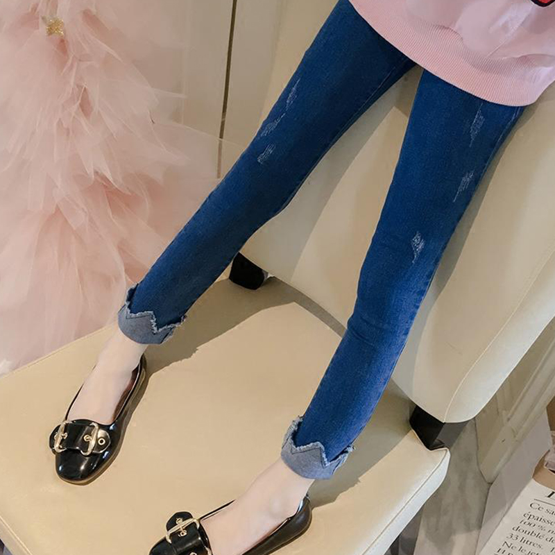 Quần jean bé gái mới 2018 eo cao phiên bản Hàn Quốc tự duỗi người phụ nữ ngoại quốc trẻ lớn cộng với quần nhung chân thủy triều hoang dã váy trẻ em đẹp