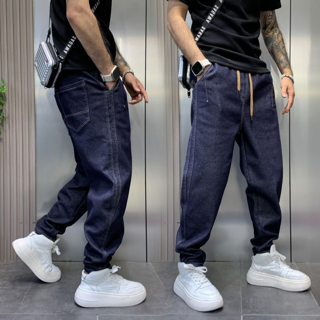 ດູໃບໄມ້ລົ່ນຂອງຜູ້ຊາຍໃຫມ່ສີຟ້າລ້າງ jeans ວ່າງຂະຫນາດໃຫຍ່ພໍ່ pants ຕີນຂະຫນາດນ້ອຍ harem pants trousers ບາດເຈັບແລະ trendy