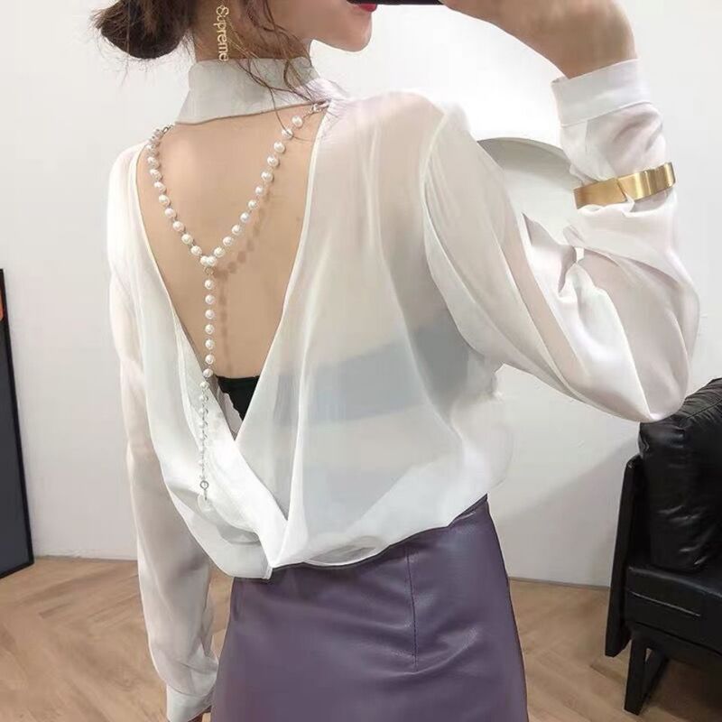 2025 Trendy Korean-Style Chiffon Sun-Protective Design with Subtle Pearl Embellishments, Backless, Sheer, Lapel, and Hollow-Out Shirt 2025 Trendy Korean-Style Chiffon Sun-Protective Design with Subtle Pearl Embellishments, Backless, Sheer, Lapel, and Hollow-Out Shirt