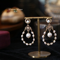 A two - wearing ear nails high - sense temperament of the renowned natural pearl earrings of the niche design exaggerated ear