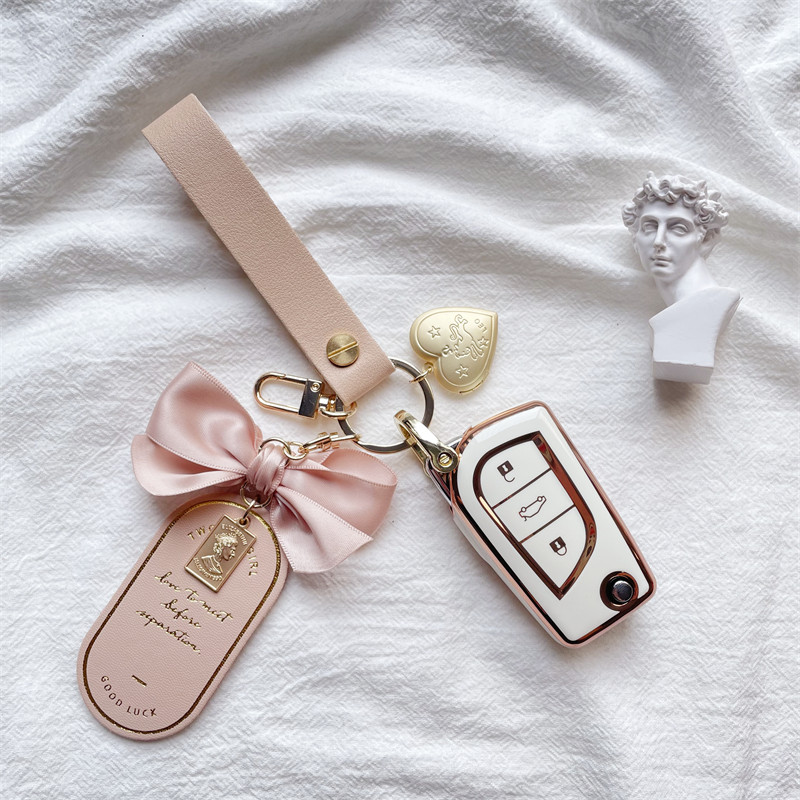 Suitable for Toyota Corolla key case CAMRY Lei Ling Han Landa RAV4REIZ car bag buckle shell female exquisite