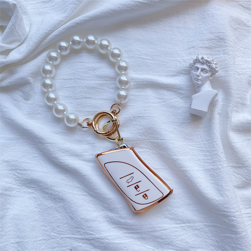 Suitable for Lingzhi key cover ux260H ES200 ES200 ES300H LS500 LS500 Chi Che bag shell buckle female