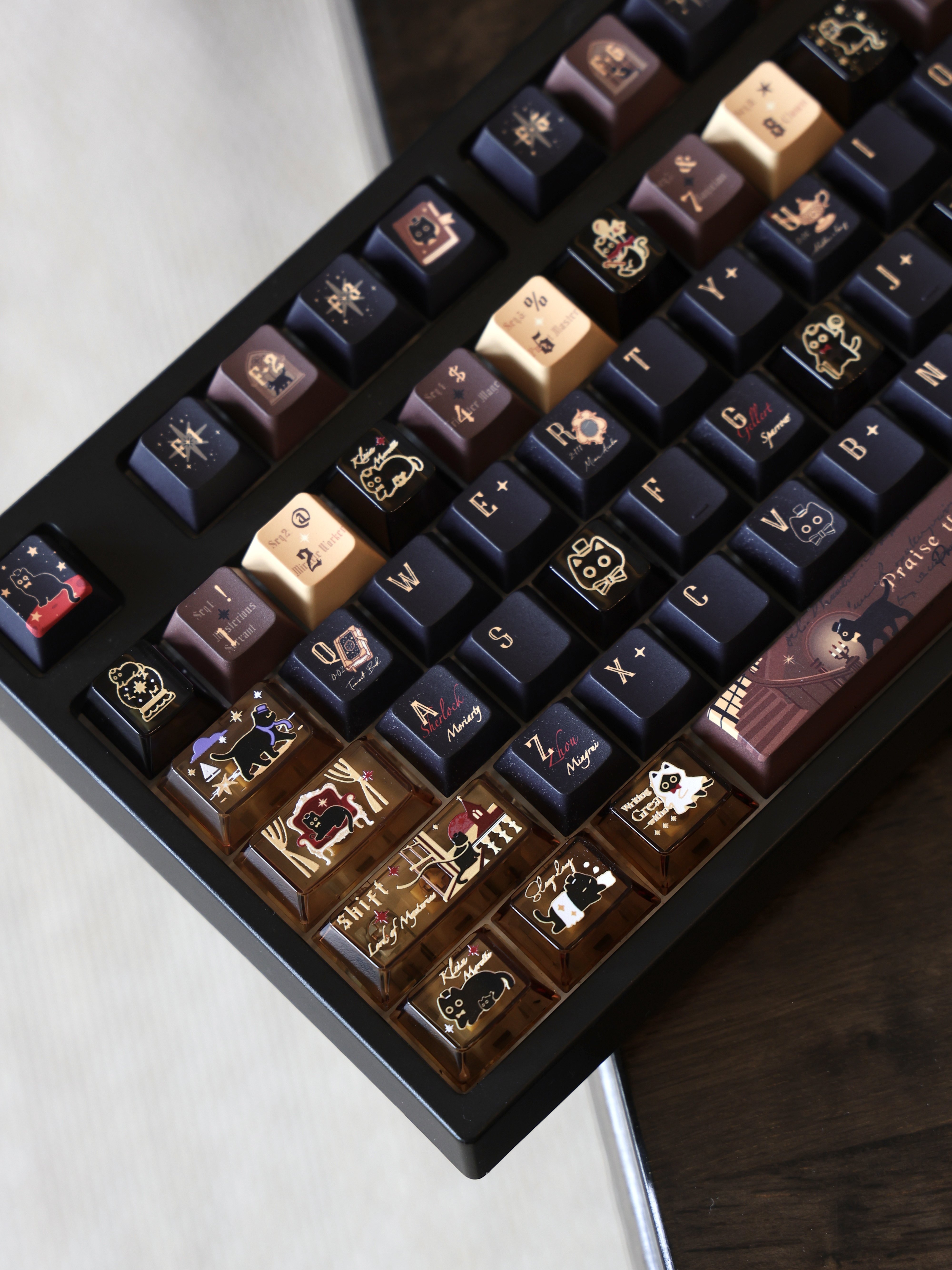 Cat-themed transparent PC accent keys mixed with dark keyboard keycaps