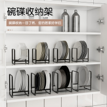 Inside the kitchen cupboards dishes dishes plates trays trays trays and dishes trays and cupboards and trays and trays dishe