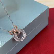 Butterfly-tied wreath diamond necklace