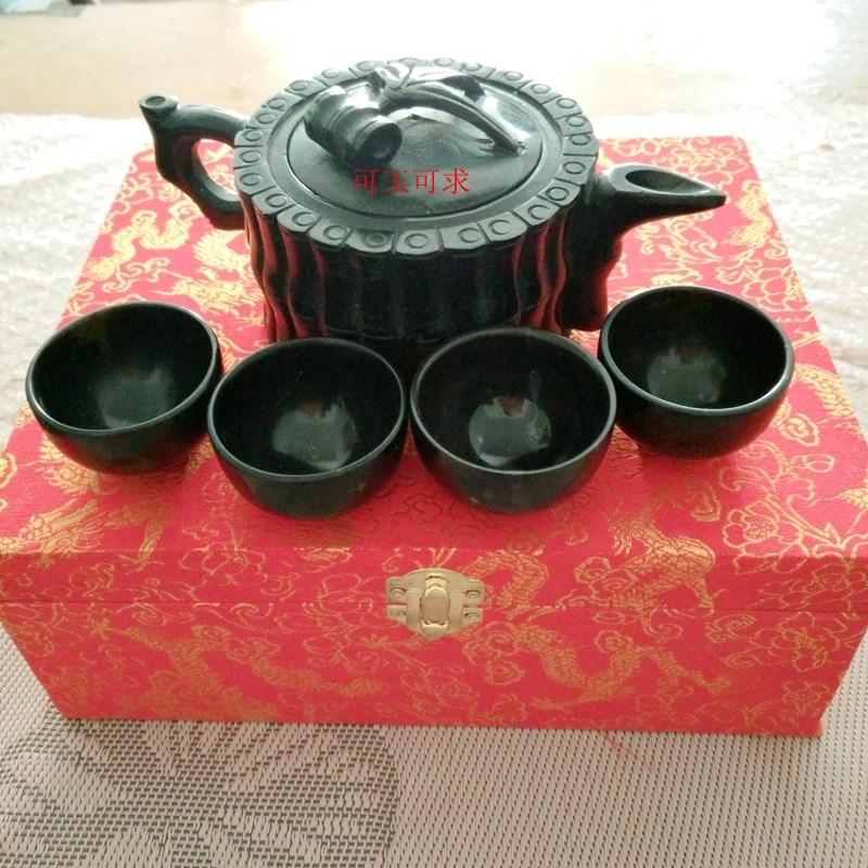 The dark green jade tea set festival high pot four cup ornaments will sell a variety of models of product customization