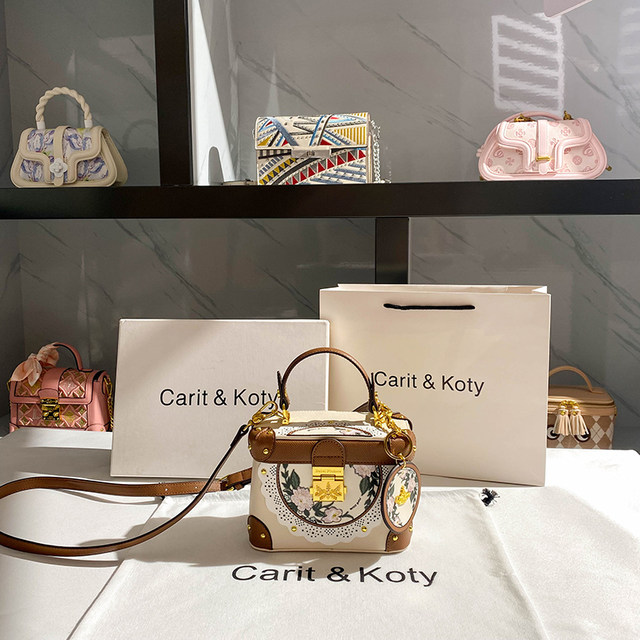 CaritKoty high-end niche hit color bucket bag female mother new embroidery portable box bag Messenger