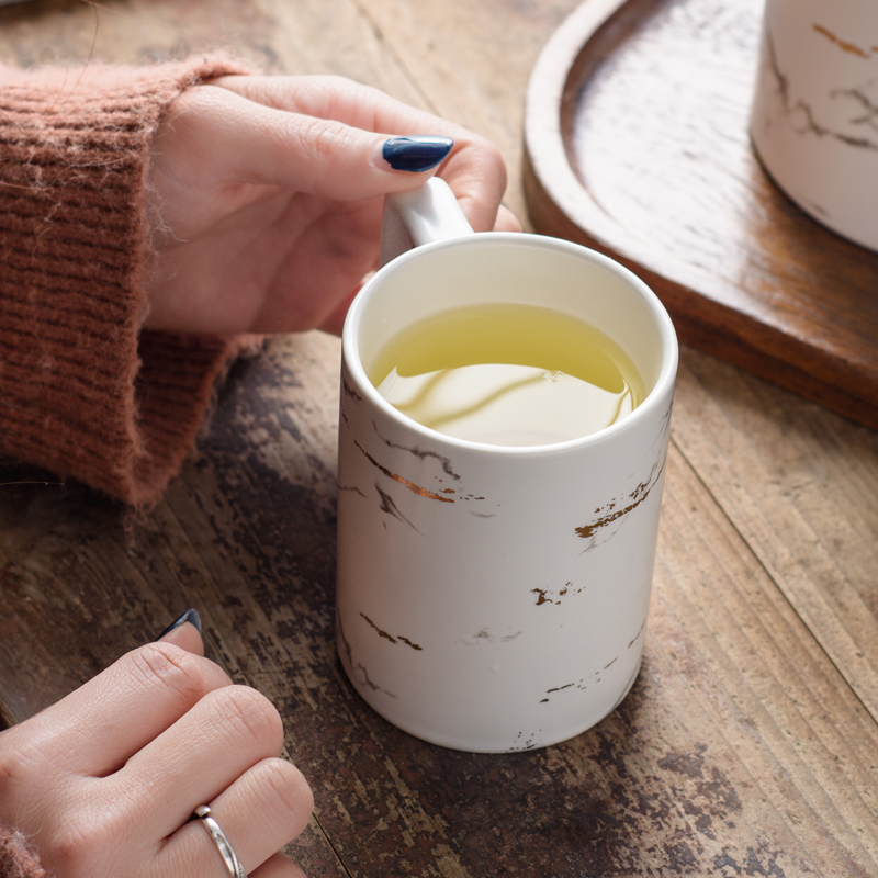 The Nordic idea ceramic tea set suits for domestic large capacity flower pot male move woman pure manual small tea cups