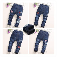 Quần áo trẻ em mùa đông quần denim dày bé trai quần âu 4 quần bé gái cộng với nhung 3 cộng với cotton dày 12 tuổi quần jean trẻ em quảng châu