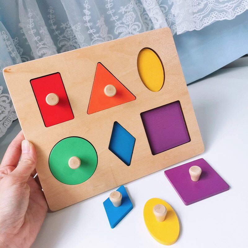 Babies and young Montz teach geometric shape panel graphical color pairing with wood toys