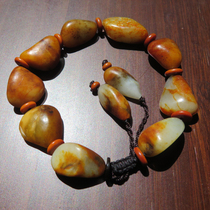 Rare dialect treasure Xinjiang Yulong River warm old ripe yellow Qin skin white jade seed raw stone bracelet bracelet w2