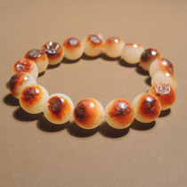 I was shocked by the dialect rare Hetian jade Xinjiang red skin white jade seed material card 12mm round bead bracelet h7