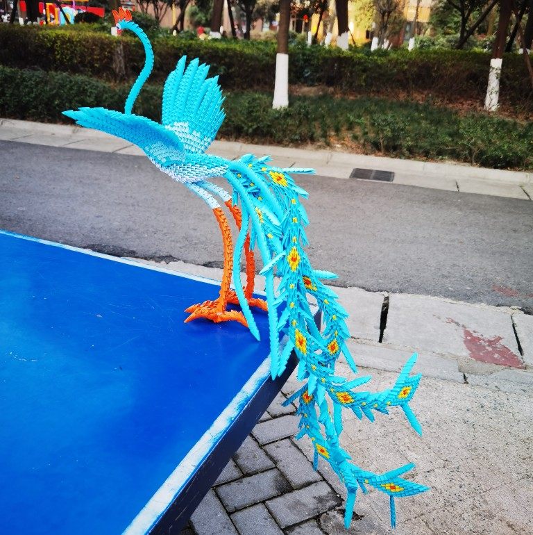 Paper edge handmade triangular insert material origami Peacock making Blue Phoenix creative DIY assembly toy paper cut