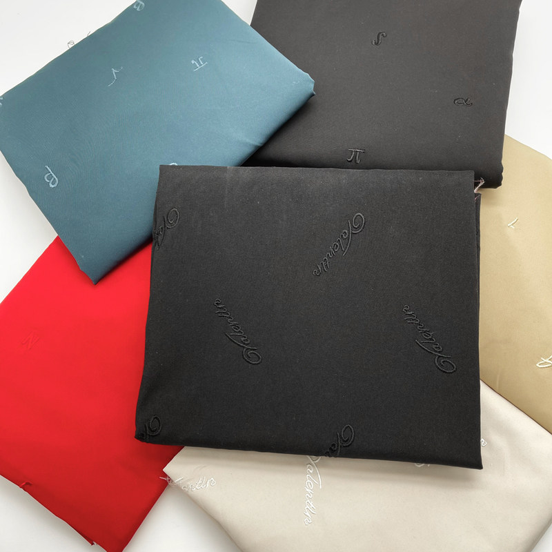 Direct filling embroidery three-in-one embroidery solid color down jacket fabric autumn and winter cotton-padded trousers quilting-free fabric