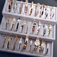 Phiên bản tiếng Hàn của vòng tay mới bằng vàng hồng bằng thép titan vòng tay bốn lá cỏ ba lá nữ chống dị ứng mở vòng đeo tay phụ kiện trang sức Nghĩa Ô vòng tay trơn vàng 18k